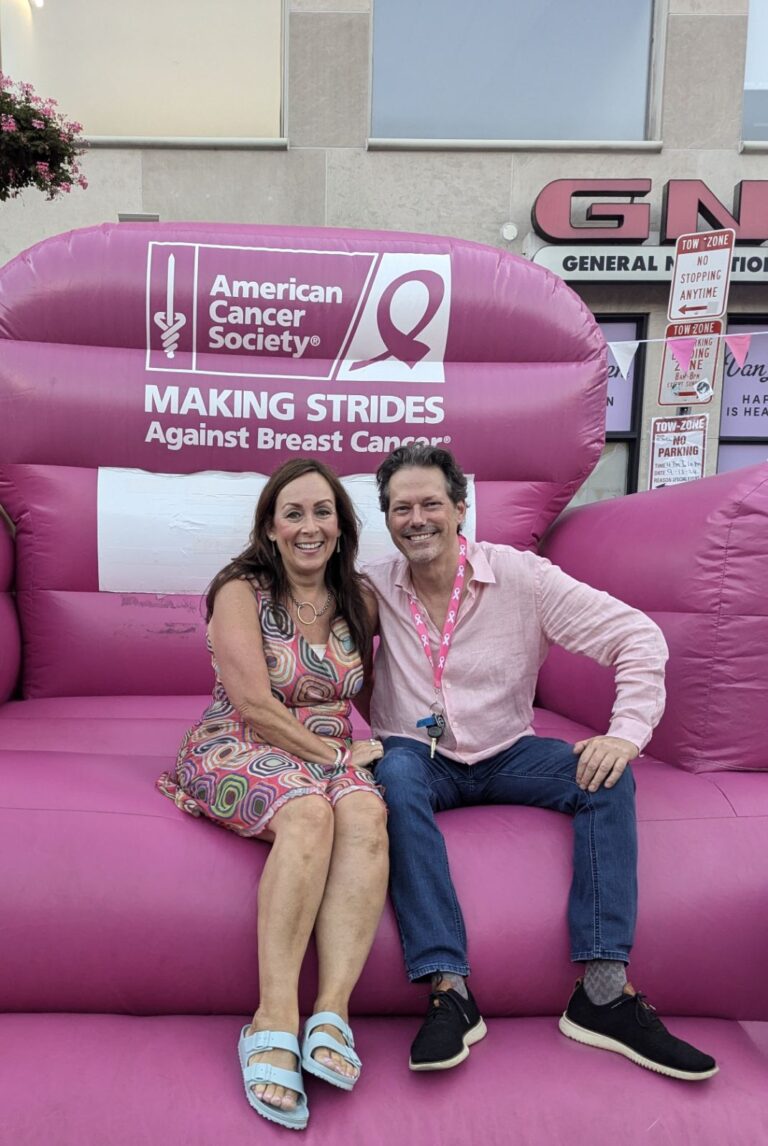 sitting in pink couch